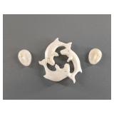 Assortment of bone and ivory pendants and platchet