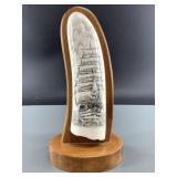 L.P. scrimshaw of a sailing vessel on old mammoth