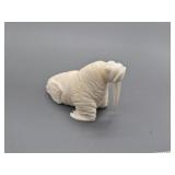 Ben Pungowiyi ivory carving of a walrus, 2" tall x