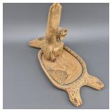 Henry Shaving cottonwood carving of a hunter and p