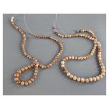 2 Strands of fossilized ivory beads