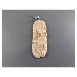 Carved mammoth ivory pendant of several bears with