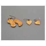 2 Pairs of fossilized ivory earrings: 1 needs new
