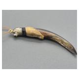 Intricately made seal claw pendant with a scrimsha