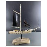 Al Kolokie ivory and baleen ship set on moose antl