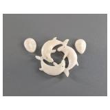 Assortment of bone and ivory pendants and platchet