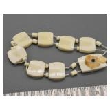 Ivory and fossil ivory stretch bracelet, needs res