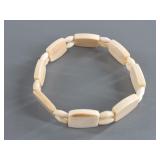 Fossilized mammoth ivory stretch bracelet carved o