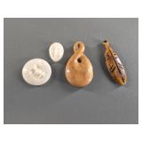 Variety of fossilized ivory pendants and platchets