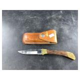 Vintage folding knife with leather sheath