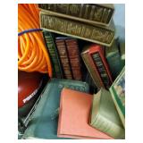 Shelf lot including books,burner stove,lamterns,et