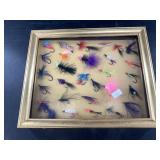 Shadow box with display of fishing flies