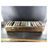Long antique copper broiler with assorted DVDs, 38