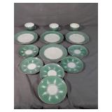 Matching German teacups, saucers, dessert plates