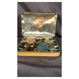 Tin Full of Costume Jewelry