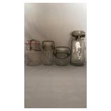 Multiple Sized Jars With Bales