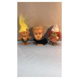 Trolls and a Doll Head