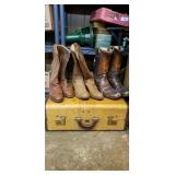 3 Pair Cowboy Boots And A Suitcase