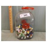 MILK JUG WITH MARBLES