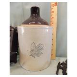 WESTERN STONEWARE JUG & WROUGHT IRON