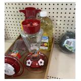 Bird feeders watered and hummingbird nectar