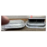 Pair of trailer roof air vents. Open to front or