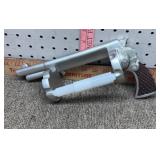 Revolver toilet paper roll holder
