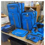 Blue 5 pc set - 1 large suitcase, 1 small