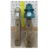 Pair of vintage glass insulators and wood