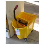 Mop bucket missing 1 wheel