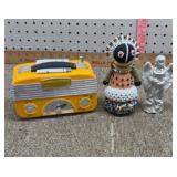 Small amfm radio & fertility doll