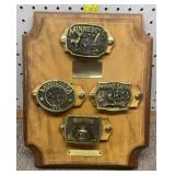 Set of 4 MN Commemorative belt buckles on display