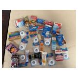 Lot of BandAids, Toothpaste, Dental Floss