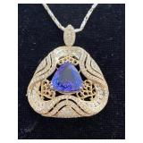14K TANZANITE AND DIAMOND PENDANT/ENHANCER