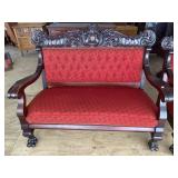 SOLID MAHOGANY HEAVILY CARVED SETTEE WITH LARGE