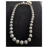 14K GRADUATED STRAND OF TAHITIAN CULTURED PEARLS