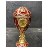 GOLD ENAMEL FABERGE JEWEL EGG CLOCK ON STAND