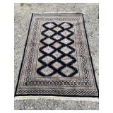 6FT 8IN X 4FT 2IN HANDMADE RUG