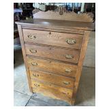 5 DRAWER OAK TALL CHEST WITH CARVED SPLASH