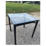 MODERN IRON AND GLASS TOP TABLE