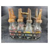 SET OF OIL BOTTLES IN CARRIER