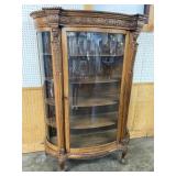 LARGE CARVED OAK BOW GLASS CHINA CLOSET