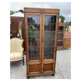 OAK LEADED GLASS TALL BOOKCASE