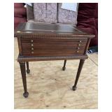 LEATHER TOP COIN COLLECTORS CABINET ON LEGS