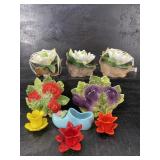 9 PIECE LOT OF POTTERY AND GLASS FLOWERS