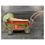 SMALL DOLL CARRIAGE WITH DOLL