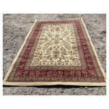 7 FT 8 IN X 5 FT 2 IN MACHINE MADE RUG