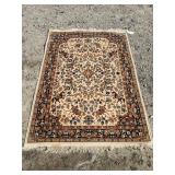 5 FT 7 IN X 4 FT MACHINE MADE RUG