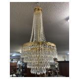 LARGE CRYSTAL AND BRASS CHANDELIER