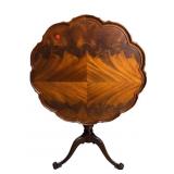FLAME MAHOGANY CARVED BASE TILT TOP TABLE